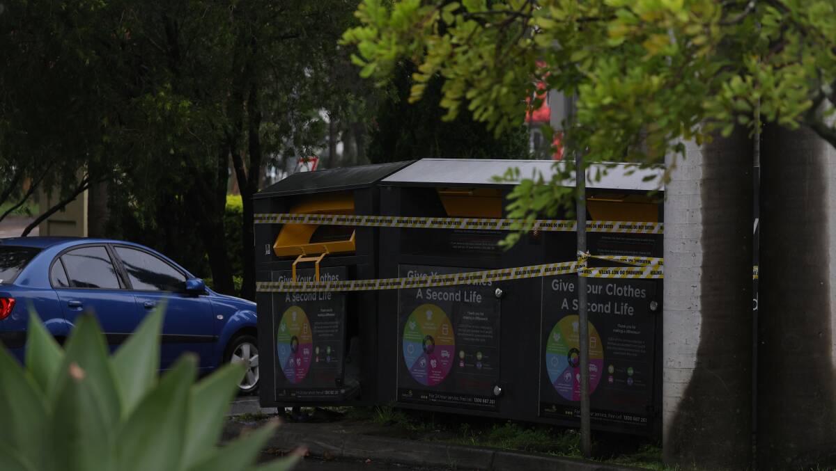 The charity bins were taped off on February 20 after the man's body was found. Picture by Marina Neil