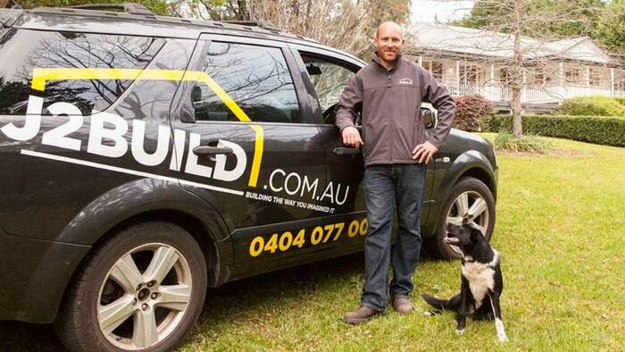 J2Build owner Jacques Dezarnaulds with his dog Mali. Picture J2Build