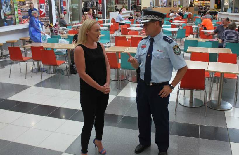 SQUARE SAFETY: Retail manager for Goulburn Square, Natalie Young, talking with Hume LAC Detective Inspector Chad Gillies in February, 2017 about 12 month bans to curb antisocial behavior. Photo: Mariam Koslay