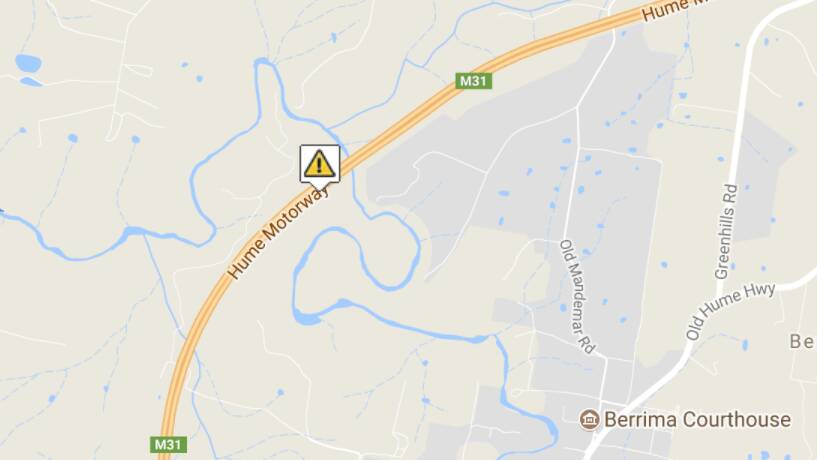 Truck crash and fire closes Hume Highway, Berrima