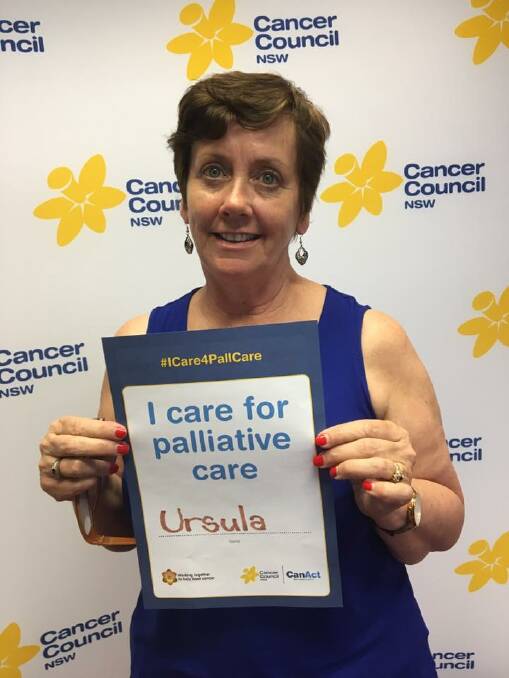 PLEDGE: Ursula Stephens holds up her pledge for the I Care for Palliative Care campaign. Photo: supplied. 