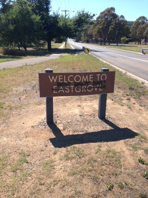 ACTION: The 'Welcome to Eastgrove' sign painted over with black paint. Residents are encouraged to report acts of vandalism to the police. Photo: supplied. 
