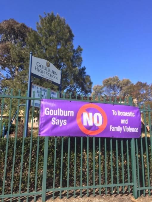 ‘Goulburn says NO to Domestic Violence’ banner hanging outside Goulburn High School. Photo: supplied. 