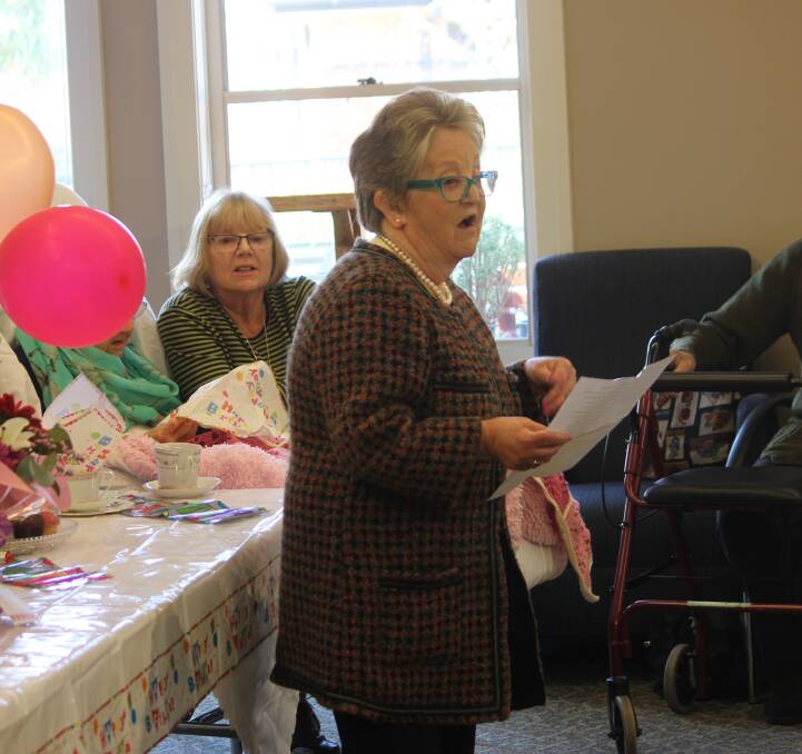 FAMILY: Daughter Anne Biddle speaks about her childhood and Hilma's love of animals and gardening to a full room. Her sister Pauline also attended.