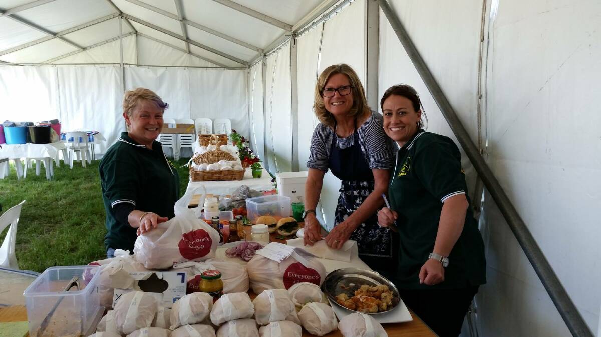 RIDING FOOD: Volunteers came together for the Lynton Horse Trials to prepare food and raise money for Goulburn's Riding for the Disabled. Photo: supplied. 