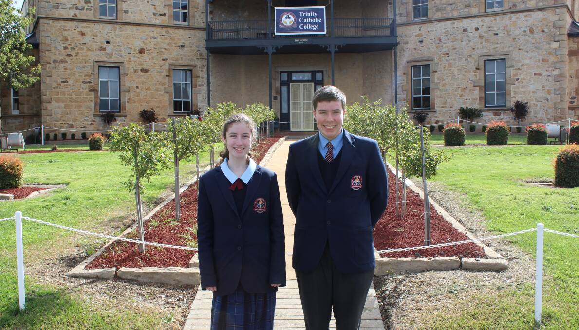 LANGUAGE STARS: Emily Clark and Alexander Dawes bring home gold for Trinity Catholic College in Languages. Photo: Mariam Koslay.  