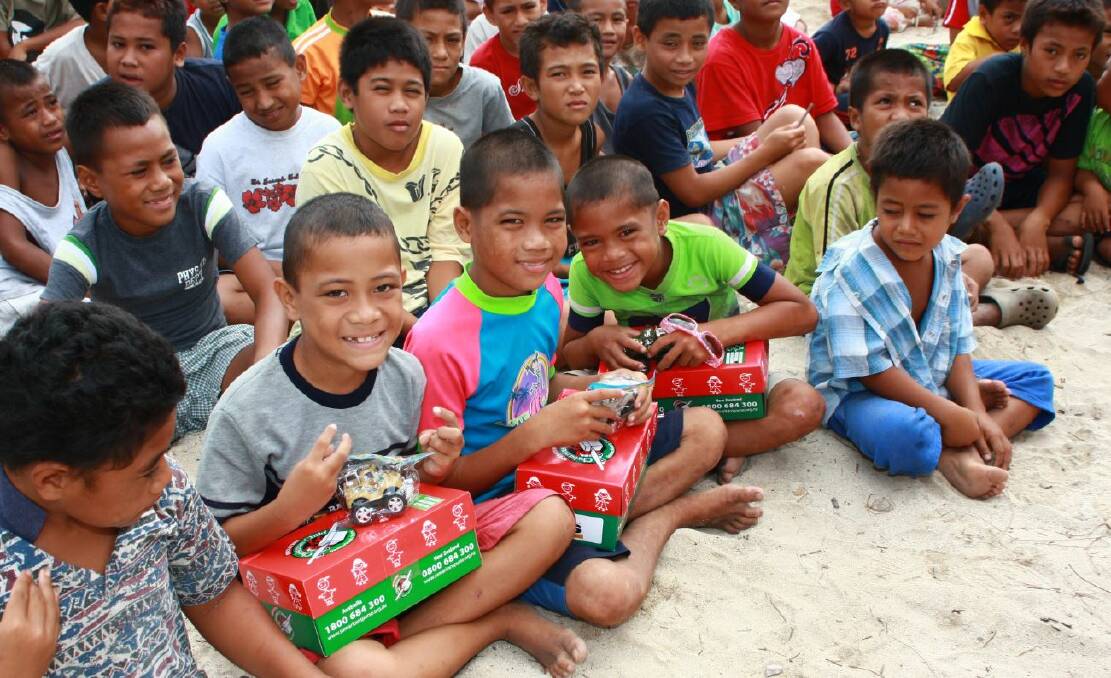 UNFORGETTABLE CHRISTMAS: 21674 packages were given to children in Samoa last year from all over the world. This is one of the many cities OCC targets. Photo: Operation Christmas Child.  