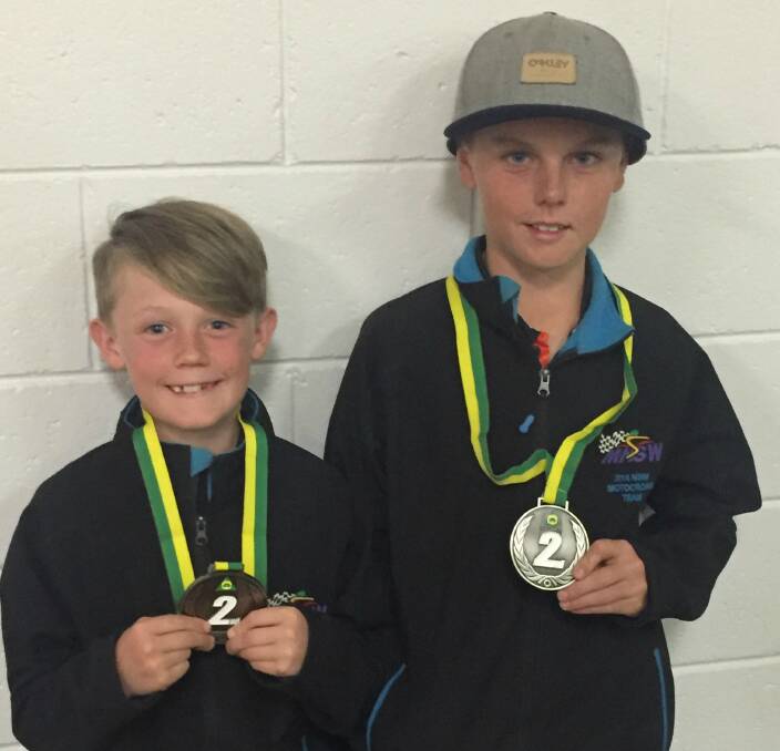TWO NATIONAL TWOS: Kayde and Ryder Kingsford with their second-placed medals in their respective classes at the Australian Junior Motocross Championships in Renmark, South Australia. Photo: supplied