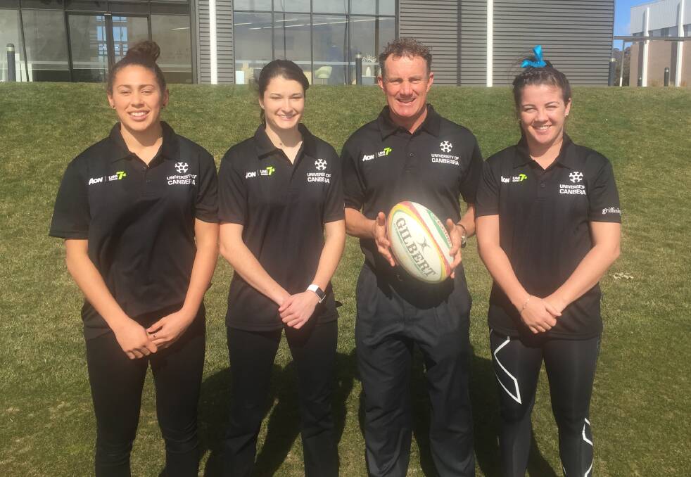 UNI SEVENS REPS:  Talei Wilson, Zoe Curran, David Grimmond (coach), Sammi Wood) at the Canberra Uni sevens squad launch on Friday. Photo: supplied.