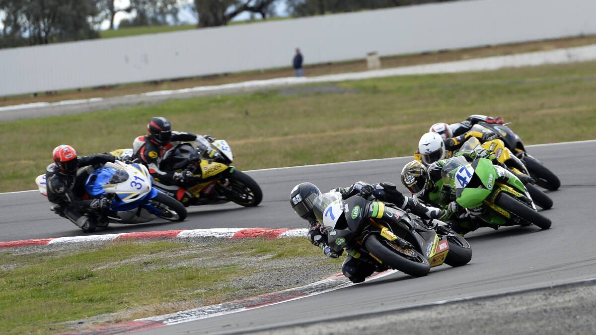 IN FRONT: Tom Toparis in a six way fight at the third round of the ASBK at Winton Motor Raceway in April. Photo: Russell Colvin
