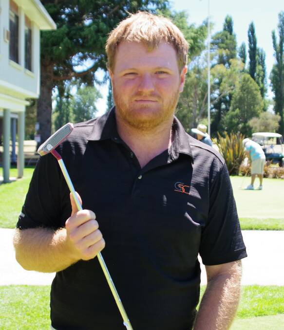 AT WORK: Jake Mitchell is happy to be following his dream of becoming a golf professional through the PGA trainieeship program, working with Andrew Grove at the Goulburn Golf Club. Photo: Darryl Fernance