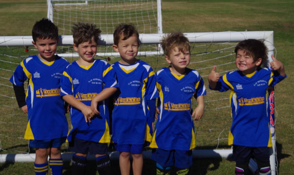 HAVING FUN: Workers under 6 Mini Roo soccer players Isaac Skelly, Dylan Miller, Harley Beltram Jackson Chandler and Joshua Kuitkawski want encouragement from the sideline not negative comments. Photo: Darryl Fernance