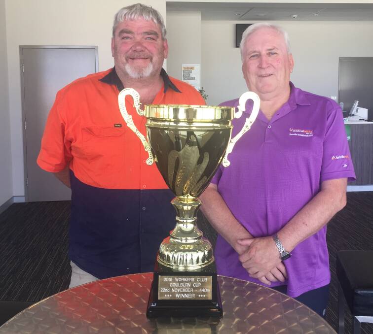 HOPEFUL: Two of the My Boy Rylan syndicate owners, Glenn Swift (left) and John Payne eyeing off tomorrows cup. Photo: supplied