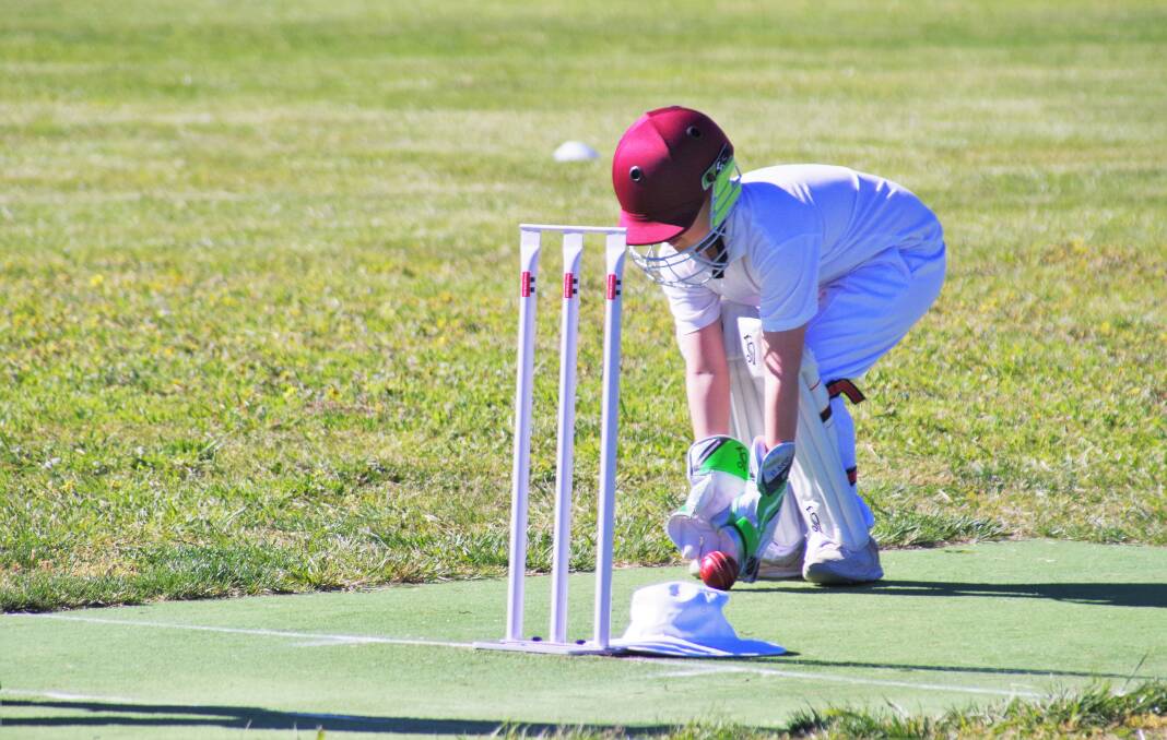 Under 10s St Joseph's Maroon wicket keeper Frankie Saville was taking the responsibility of his job very seriously against St Joseph's Red.