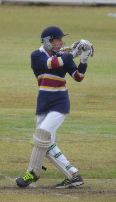 BATTING: Josh Condylios did not last long at the crease under Trinity's solid bowling attack, but did a good job as keeper for United U16s. Photo: Darryl Fernance