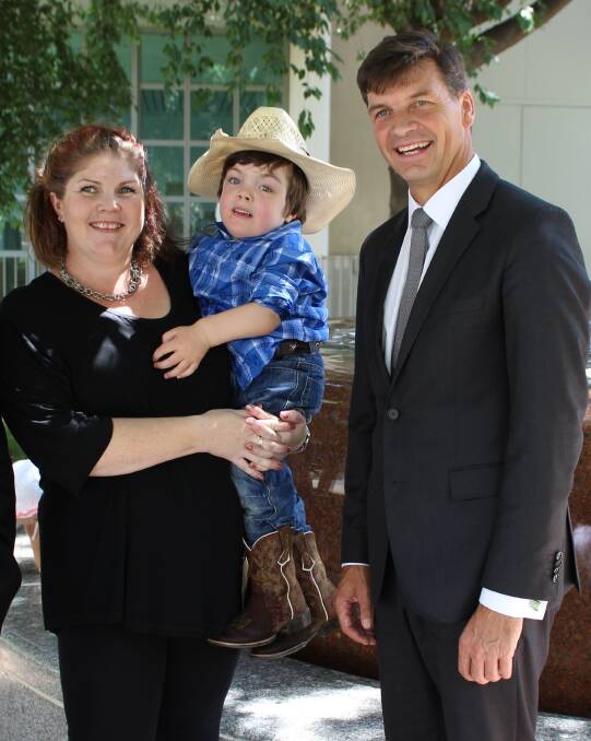 BREAKTHROUGH: Beau Cosgrove, pictured with mum Sam and MP Angus Taylor.
