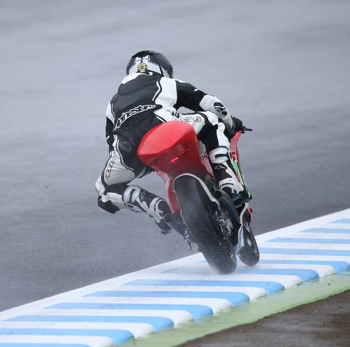 CONDITIONS TOUGH: Toparis kept his cool during the 13-lap Moto3 race. He said it was the hardest conditions he has raced in. Photo: Andrew Northcott - AJRN