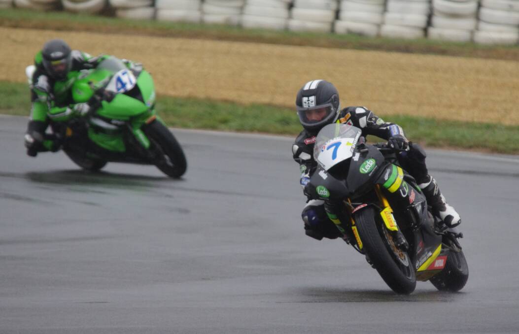 LEADING: Goulburn's Tom Toparis ahead of Giuseppe Scarcella turning into the main straight during race one of the ASBK Motul Supersport series. Photo: Darryl Fernance