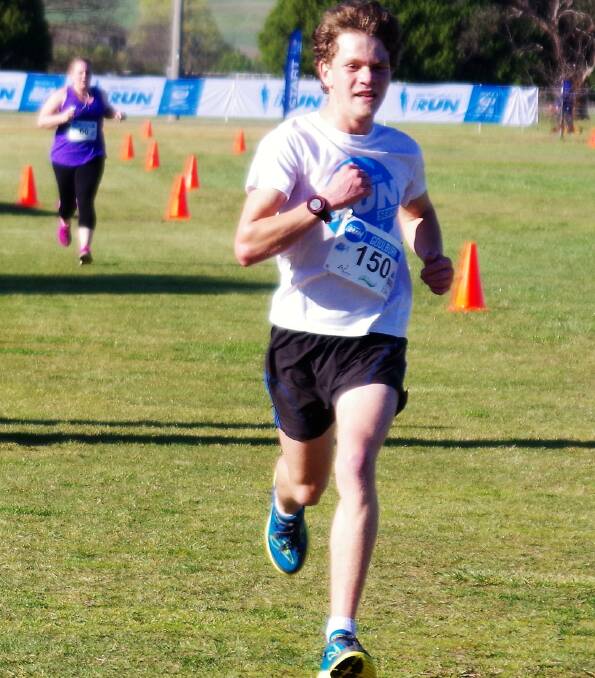 Johathan Moore charging home strongly after completing the 10km runn faster than any other Goulburn local to claim the Peter Oberg Memorial Trophy. Photos: Darryl Fernance