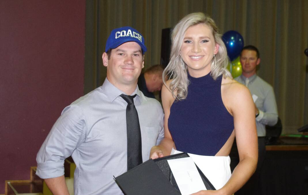 Women's League Tag Best and fairest Stephanie Wegner was presented with her award by coach Luke Gray. She was the women's top try scorer.