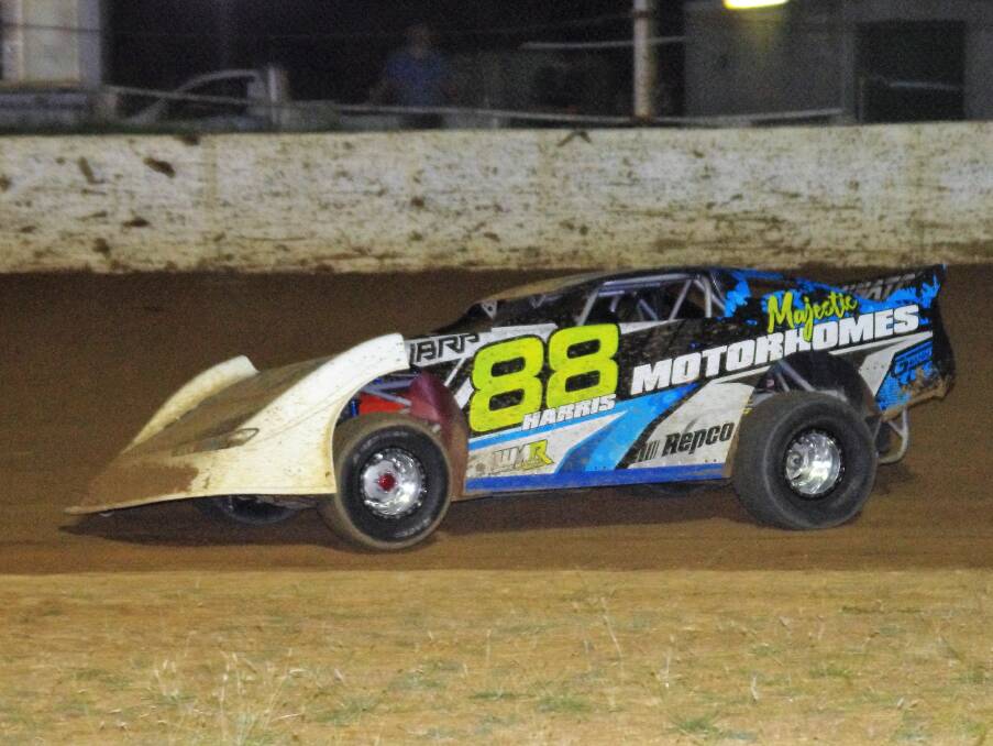 SUPER QUICK: Lyle Harris from Bega in the final stages of the Super Sedan feature race at Goulburn Speedway on Saturday night. Photo: Darryl Fernance