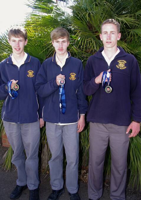 ATHLETES: Ryan Goad, Evan Goad and Joseph Kremer with their medals from the NSW All Schools Championships. Photo: Darryl Fernance