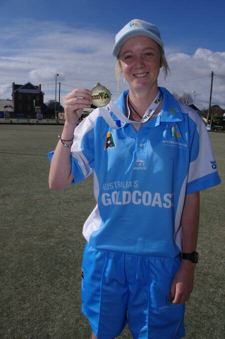 FIRST WIN: Ellen Ryan with her 2015 Australian Singles Championship medal at the Goulburn Railway Bowling Club where she first took up the sport. File photo: Darryl Fernance