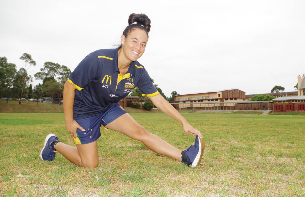 BRUMBIES SUPER W: Ashley Kara on the Goulburn High oval stretching up as she embarks on the Brumbies rigorous Super W training schedule. Photo: Darryl Fernance