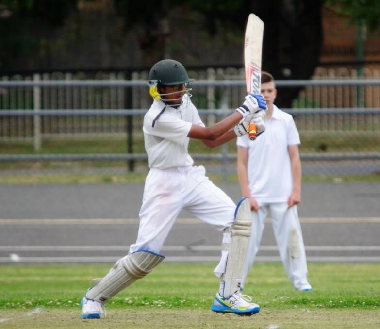 OPENER: Abdul Raheem, 13, opened for Wollondilly Gold under 14s on Saturday against Wollondilly Green and was still there at the end. He then opened and closed his team's batting in senior cricket. Photo: Darryl Fernance
