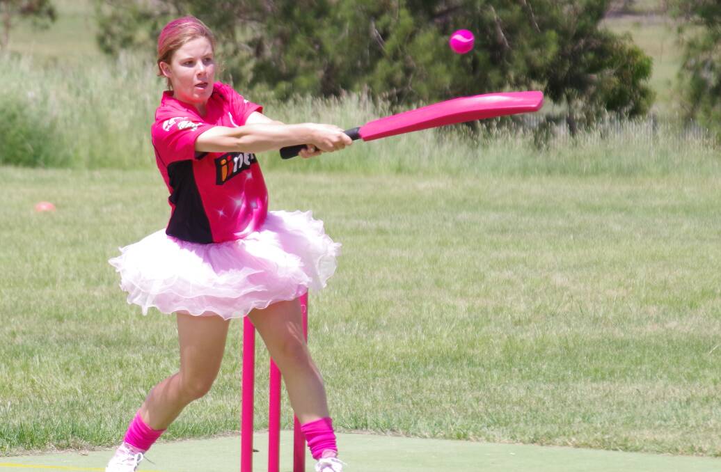 BIG HIT: Emma Baxter, playing for Rahmen Noodles, gets an edge in one of the Pink  Stumps Day matches at Mulwaree High on Friday December 8. Photo: Darryl Fernance