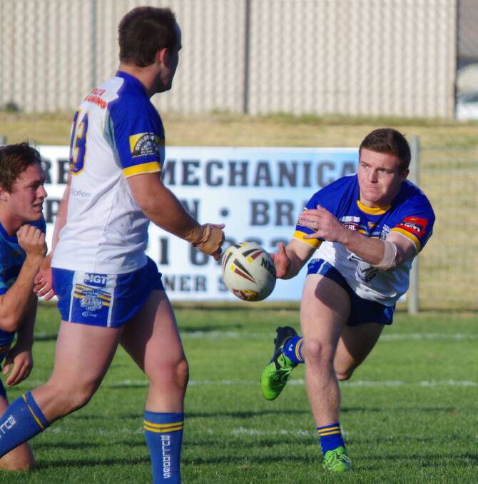 PASSING: Joey Roberts gets a clearing pass away during the GWC Bulldogs first grade game against West Belconnen Warriors at the Workers Arena. Photo: Darryl Fernance