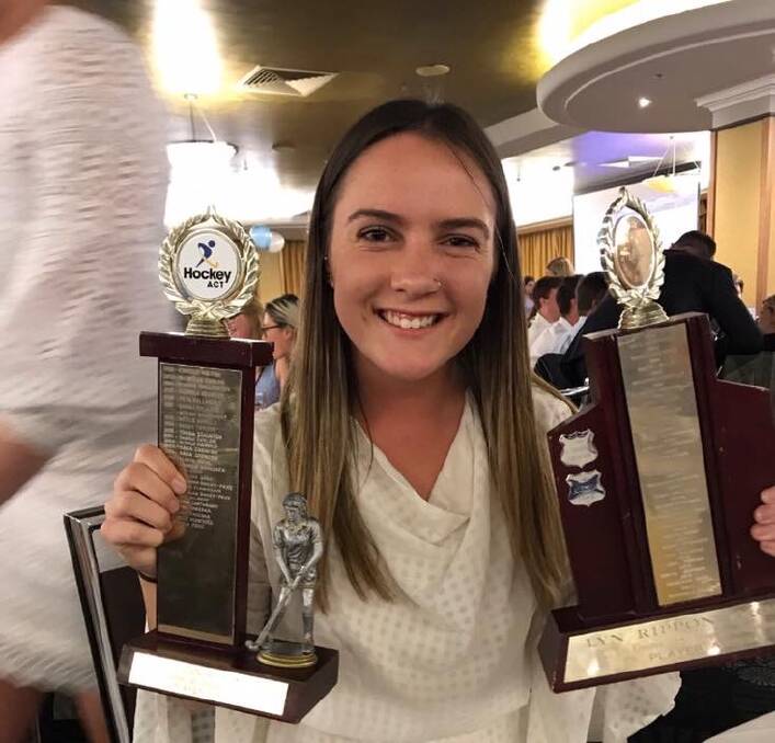 TWICE RECOGNISED: Aleisha Price with her under 18s and under 21s most outstanding player trophies. Photo: Donna Price