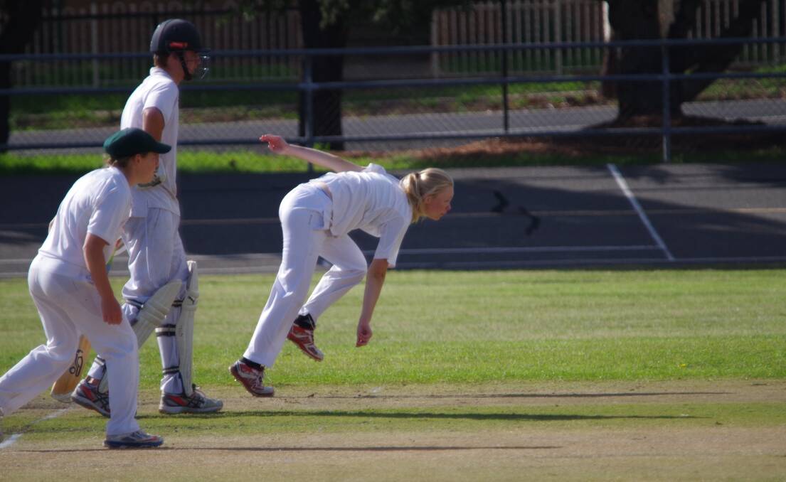 Bella Grieg bowling for Wollondilly under 16s with Crookwell's Sam Cramp off strike. Photo: Darryl Fernance