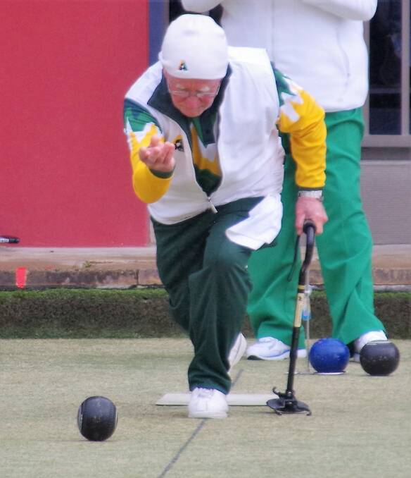 GOOD LENGTH: Reg Thoms follows through after a well directed bowl in the mixed pairs championships first round. Photo: Darryl Fernance
