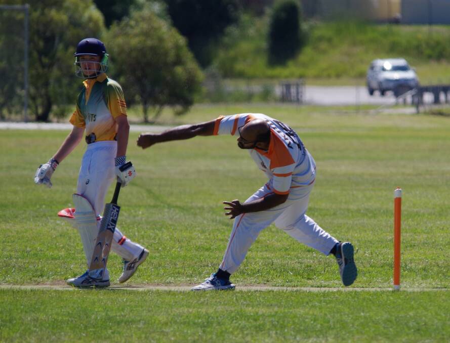 Macleay Robinson off strike, ready for a quick single as Warriors' Akhil Nair delivers another on target delivery.