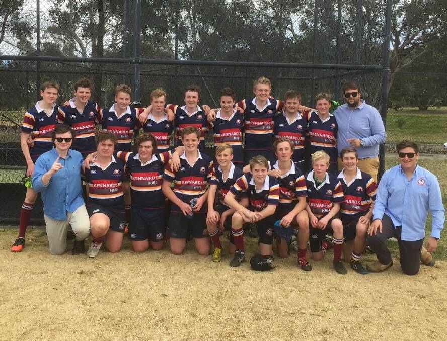 CHAMPIONS:  Goulburn's Trinity Catholic College under 15s, winners of the 2017 ACT Junior Rugby Union's division two grand final, at Viking Park on September 3. Photo: Supplied