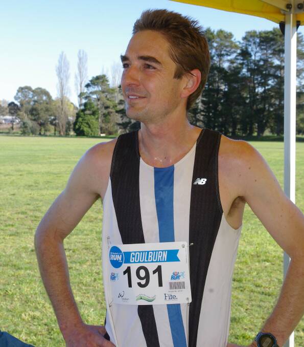 London Olympian Martin Dent looks back to watch other runners coming home after registering his winning time in the 10km Goulburn Rocky Hill Fun Run on Sunday morning. Photos: Darryl Fernance