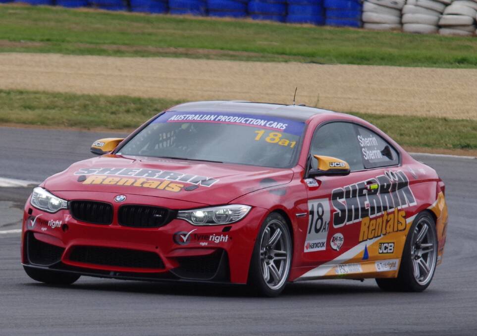 SERIES WINNER: The Sherrin's BMW M4, co-driven by Iain and Grant Sherrin for the team managed by their father Michael, steadily lapping other competitors in race one on Saturday afternoon. Photo: Darryl fernance