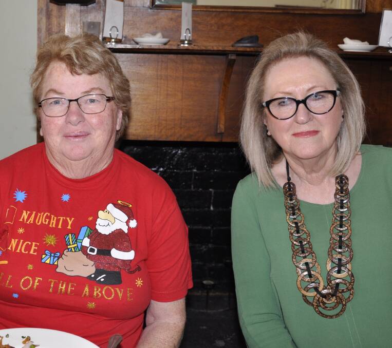 Jenny Jobson and Bev Walker hopped into the festive spirit at the health volunteers thank you Christmas party on Thursday.
