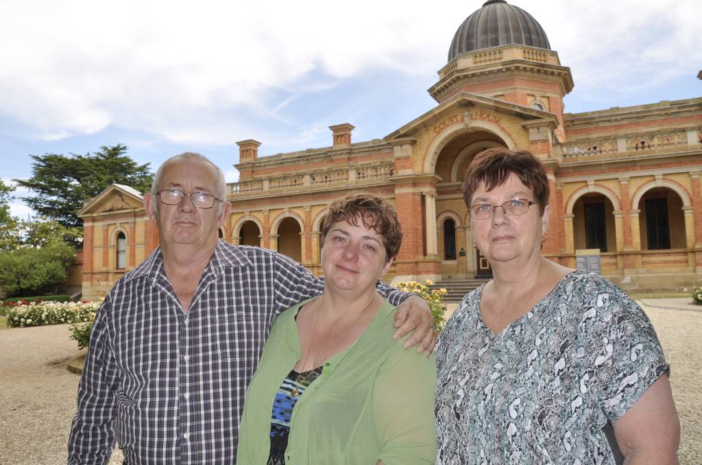 Melissa Pearce (centre) says the inquest into her partner James Hughes' death will be worth if it saves another life. She was flanked by her parents Ron and Sue following the inquest's conclusion at Goulburn Courthouse on Friday. 