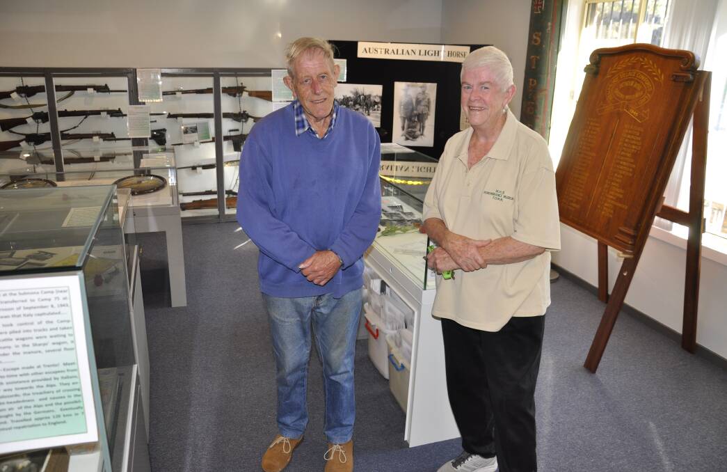 Mulwaree High Remembrance Museum volunteers Rod MacLean and Leone Morgan have spent months researching for the current exhibition, 'Ordinary People, Extraordinary Stories.' Picture by Louise Thrower.