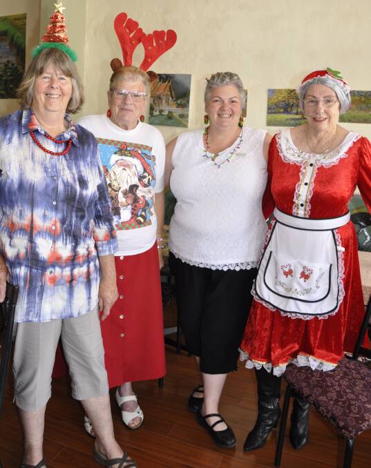 Goulburn Health Services volunteer coordinator Katherine Lee (second right) said a big thank you to suitably dressed helpers Maree Peden, Miriam Lockwood and Barbara Downey. 