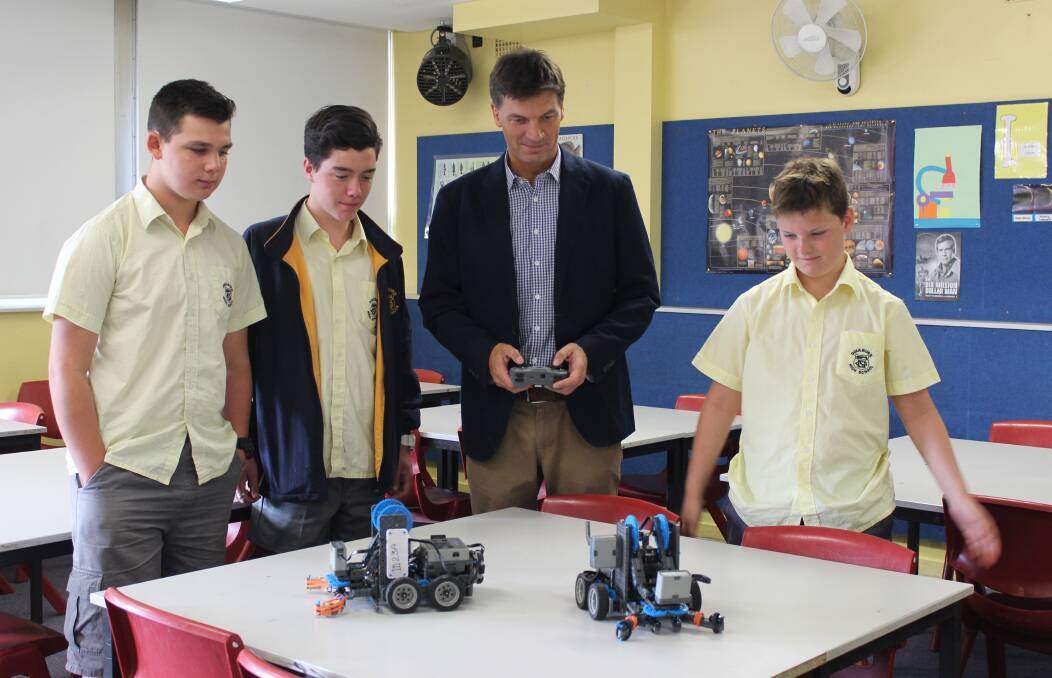 Angus Taylor with Goulburn High School students Alex Zecevic, Braxton Thompson and William Hyland.  