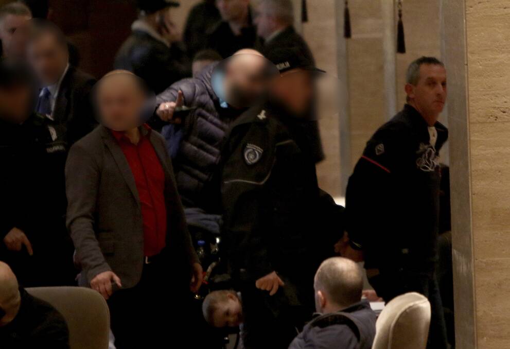Rohan Arnold (right) was arrested at Belgrade's Metropol Hotel in mid January. Photo: Antonio Ahel/ATAImages. 