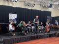 Young people tried out orchestral instruments at the Hume Conservatoroum's recent holiday workshop, Squawkestra. Picture supplied.
