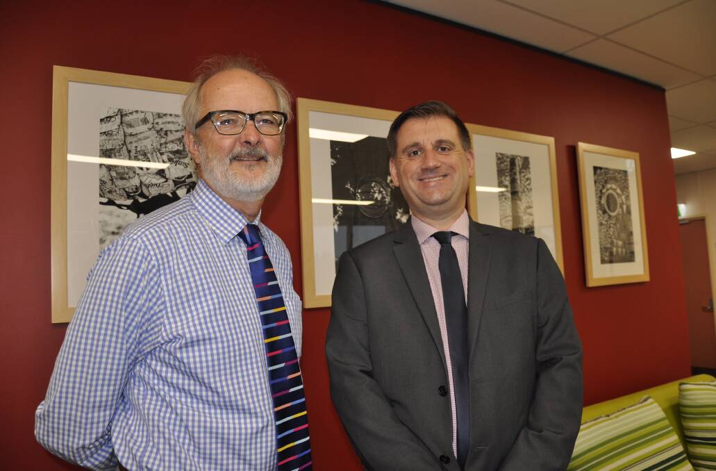MEETING: Goulburn and District Chamber of Commerce president Mark Bradbury and Southern NSW Health District CEO, Andrew Newton.  

