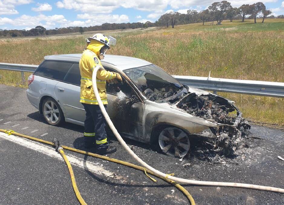Tow RFS crews attended the car fire on the Federal Highway, south of Goulburn. Photo by Southern Tablelands RFS. 