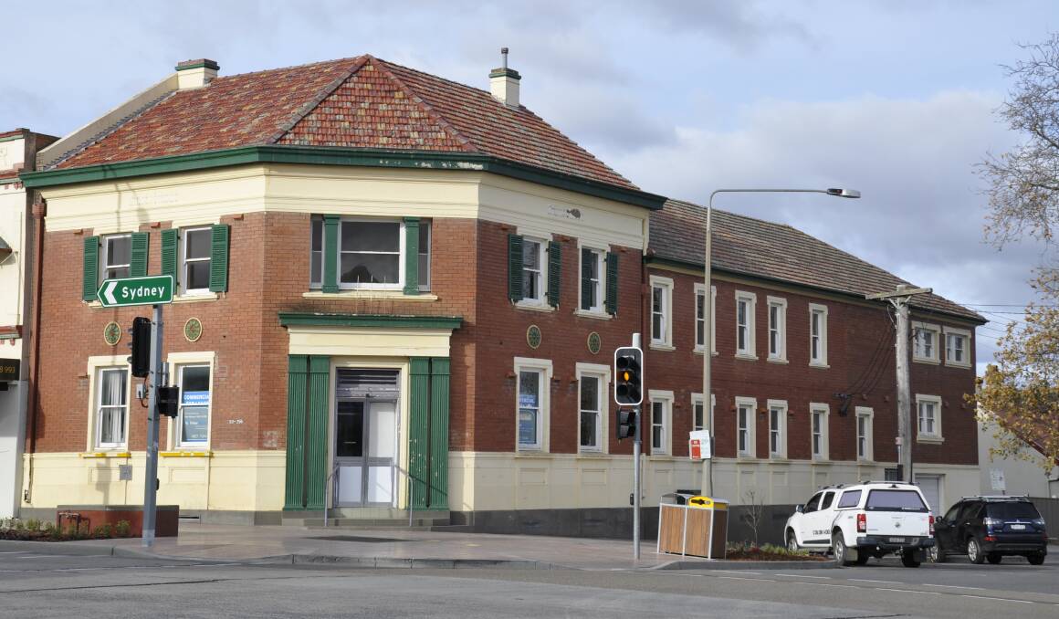 The former Rural bank building will be converted into a 30-room motel under plans before the council. A four-storey addition at the rear is also proposed.
