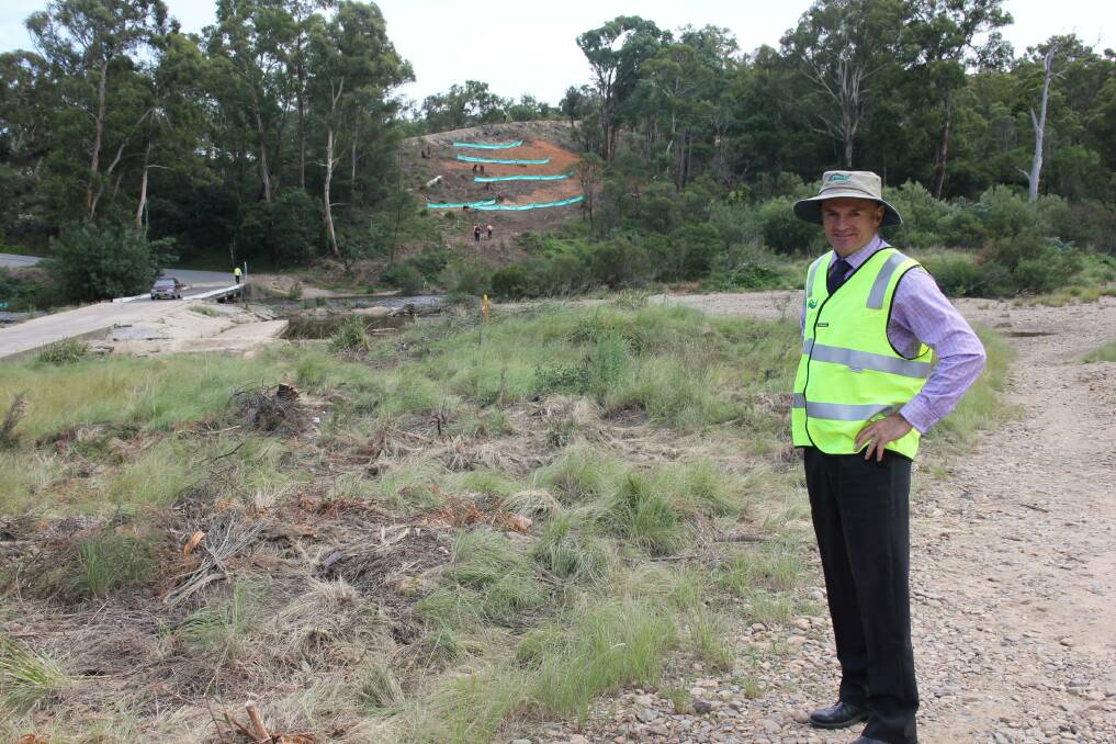 Goulburn Mulwaree Council operations director Matt O'Rourke pictured at the old Oallen Ford bridge in February, 2015 as construction was beginning.