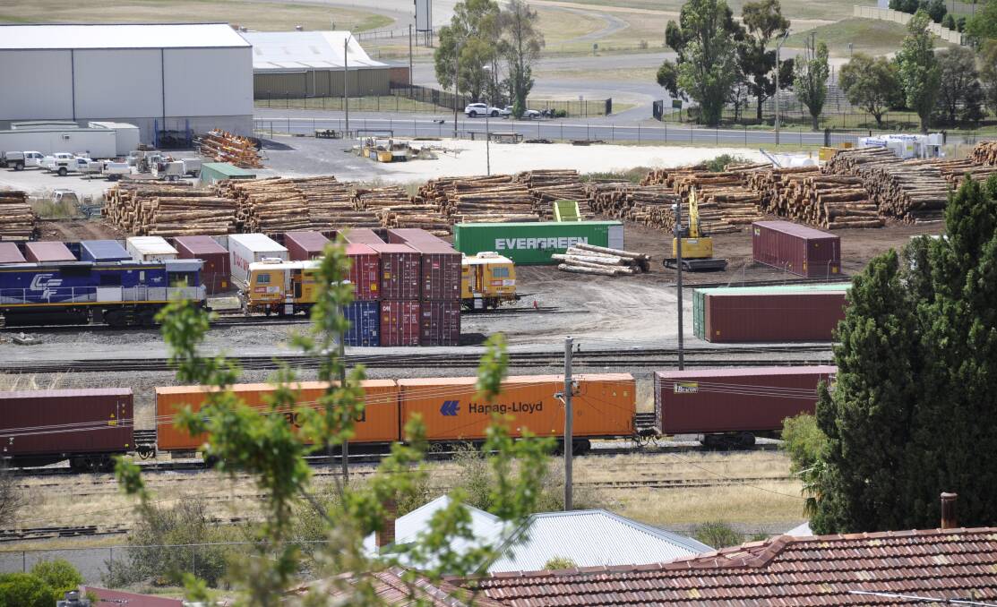 BIG OPERATION: Fumigation of logs with methyl bromide and their transport started at Chicago Freight's rail hub some four months ago.